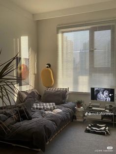 a living room filled with furniture and a flat screen tv