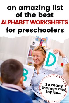 a woman holding up the letters for children to use in alphabet worksheets with their teacher