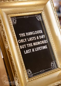 a gold frame with a quote on it that says, the hangover only last a day but the memories last a lifetime