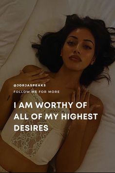 a woman laying in bed with her hand on her chest and the words, i am worthy of all of my highest desries