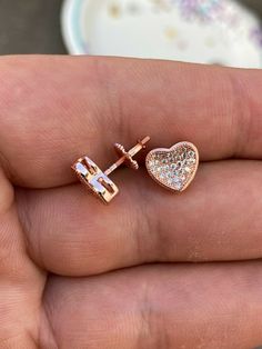 "Amazing stud earrings Solid 925 sterling silver with 14k rose gold plating Stamped 925 for authenticity Wont turn your ears green! 2ct vvs man made diamonds SUPER ICY About 0.35\" (9.5mm) wide perfect large size! Pair weighs around 2.6 grams Screw backs for a secure fit!" Elegant Rose Gold Huggie Heart Earrings, Rose Gold Cubic Zirconia Heart Earrings For Anniversary, Rose Gold Heart Cut Earrings, Anniversary Rose Gold Heart Earrings With Cubic Zirconia, Rose Gold Cubic Zirconia Heart Cut Earrings, Rose Gold Heart Cut Fine Jewelry Earrings, Rose Gold Heart-shaped Cubic Zirconia Earrings, Luxury Rose Gold Heart Earrings, Fine Jewelry Rose Gold Heart Earrings For Pierced Ears