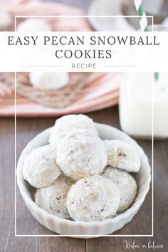 easy pecan snowball cookies in a white bowl on a wooden table with a glass of milk