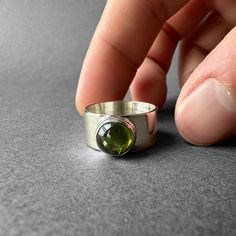 Natural Green Tourmaline Silver Ring - Green Chrome Tourmaline Ring Size 7 - Completely Handmade & Silver Gemstone: Green Tourmaline (Chrome Tourmaline)  Metal: Pure and 925 Sterling Silver Stone Cut: Cabochon Stone Size: 9.0 mm x 9.0 mm - 0.35 in - 0.35 in Weight: 6.22 grams (31.1 carats) total weight of stone and silver. For ring orders, ring resizing is free. Chains are gifts for necklace orders..  Note: We don't use any filters for photos. The details may not be clear. Feel free to contact us with any questions, special orders or additional photo or video requests. We will be happy to provide more information! :) WORLDWIDE FedEx, UPS or TNT EXPRESS MAIL SERVICE (Delivery time: 1 - 5 business days.) LAYAWAY PAYMENT PLAN is available. ABOUT THE TOURMALINE It is a precious stone with a ve Tourmaline Birthstone Ring With Bezel Setting, Silver Tourmaline Emerald Ring, Silver Tourmaline Birthstone Ring, Tourmaline Birthstone Rings, Chrome Tourmaline, Green Chrome, Dope Jewelry, Jewelry Lookbook, Tourmaline Ring