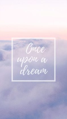 the words once upon a dream are in white square frames on a background of clouds