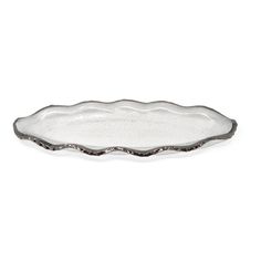 an oval shaped glass dish on a white background