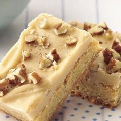 two pieces of cake sitting on top of a blue and white plate