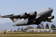 a large jetliner taking off from an airport runway