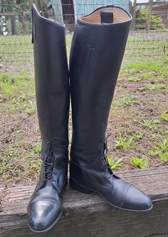 For more than 160 years, Königs--king in German--has produced exceptional quality riding boots. Handmade craftsmanship, and each boot is exceptional with quality design and traditional expertise. These lovely black field boots were made with top grain leather with a reinforced calf, rubber sole and waxed laces. The UK marked size inside the boot is 4 ½, which translates to a 6 ½ - 7 US. These boots are in excellent condition with many, many more years of use. Leather lining, c1990s. Boots Measure 9 ½ inches inside toe to heel, 10 inches outside toe to heel; height of boot outside is 20 inches, inside is 18 inches; 11 inches around ankle, 13 ½ inches around calf, 3 ½ wide sole and 1 inch heel. Field Boots, Womens Riding Boots, Top Grain Leather, Boot Shoes Women, Riding Boots, Rubber Sole, Shoe Boots, Bathing Beauties, Germany