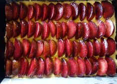 sliced strawberries are arranged on top of each other in a baking dish, ready to be baked