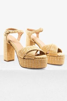 Chic Straw Sandals In Natural Color, Chic Natural Straw Heels, Chic Straw Platform Sandals, Chic Straw Sandals With Ankle Strap, Chic Straw Ankle Strap Sandals, Chic Woven Beige Heels, Chic Straw High Heel Sandals, Chic Beige Woven Heels, Chic Natural Woven Sandals