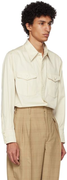 Lightweight cotton twill shirt. · Spread collar · Button closure · Flap pockets · Shirttail hem · Three-button barrel cuffs · Inverted box pleat at back yoke · Mother-of-pearl hardware Supplier color: Creamy white