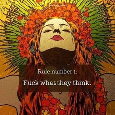 a woman with flowers on her head and the words rules number 1 f k what they think