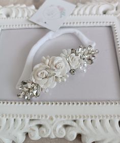 Beautiful white baby flower headband. Both for special occasions like baptism or wedding and on a daily basis. Made of the highest quality mulberry paper  flowers with the addition of small pearls and crystals.  The nylon band is super soft and stretchy. It's a one size fits all (newborn to teen) Young children and babies should always be closely supervised while wearing my products, I do my best to ensure that all parts are attached securely but please double check before using them. I try to t Newborn Headband, Newborn Headbands, Crystal Pearls