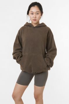 Made from a luxurious 14oz fleece, this hoodie is incredibly soft and warm, yet still breathable and moisture-wicking. The loose fit allows for a full range of motion, making it perfect for everything from running errands to lounging around the house. The kangaroo pocket provides ample storage for your essentials, while the ribbed cuffs and hem keep the cold out. This hoodie is Garment Dyed. Our garment-dyed hoodies are dyed after they're sewn, which gives them a more durable and even color, inc Los Angeles Apparel, Brown Hoodie, Garment Manufacturing, Outfit Vintage, Sweatsuit Set, Sweat Hoodie, Vintage Hoodies, Cool Hoodies, Sweaters And Leggings