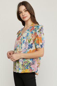 This top has a floral pattern that you will love! Its simple & comfy fit make it so easy to style for work or play! This top features a V-neckline with a self tie closure at the neck, short sleeves with elastic, smocking on the shoulders, ruffle detailing on the shoulders, neck & sleeves, has a soft & silky fabric and an a-line silhouette. We like it paired with a denim jacket for a casual look or a leather jacket for an edgier vibe. Small Bust 38" Length 25" : Medium Bust 40" Length 25" Large B Floral Print Flutter Sleeve Blouse For Brunch, Floral Print Blouse With Flutter Sleeves For Brunch, Flutter Sleeve Blouse With Floral Print For Brunch, Short Sleeve Blouse With Ditsy Floral Print For Spring, Floral Print Rayon Short Sleeve Tops, Short Sleeve Rayon Tops With Floral Print, Spring Floral Print Short Sleeve Blouse, Floral Print Short Sleeve Blouse For Brunch, Spring Flutter Sleeve Blouse With Ditsy Floral Print