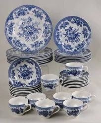 a collection of blue and white china