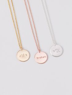 CHRISTMAS ORDER DEADLINES (WITHIN USA): Standard shipping by 12.15 Priority shipping by 12.17 Express shipping by 12.20 13mm disc necklace that can be hand-stamped on one side with your choice of initials, name, or date - endless possibilities. Modern and simple, this little piece will become a staple in your everyday jewelry collection. D E T A I L S * Disc size is approximately 13 mm * Available in 14k gold fill, sterling silver, or 14k rose gold fill * This listing is for one disc necklace P Adjustable Engraved Coin Necklace With Round Pendant, Personalized Adjustable Circle Necklace, Personalized Adjustable Circle Necklaces, Adjustable Personalized Circle Necklace, Customizable Silver Round Charm Necklaces, Customizable Rose Gold Charm Necklaces With Round Pendant, Personalized Silver Minimalist Coin Necklace, Engraved Adjustable Round Disc Charm Necklace, Minimalist Stamped Round Disc Necklaces