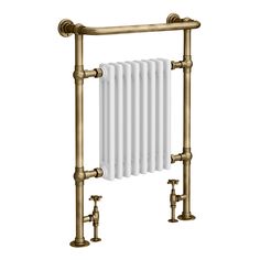 an antique style radiator with brass fixtures