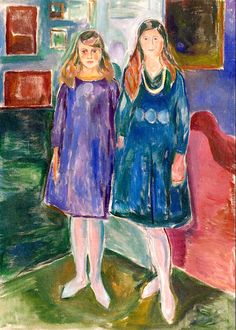 two women standing next to each other in front of a painting on the wall behind them