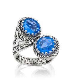 Elevate your style with this exquisite 925 sterling silver women's bypass ring. Featuring a stunning double-sided faceted checkerboard round cut blue quartz gemstone, this ring is the perfect blend of old and modern art. The filigree design, originating from Mesopotamia and Anatolia, adds a delicate touch to this statement piece. Measuring 0.95" / 24.00mm in length and 0.65" / 17.00mm in width, this intricate ring is detailed with delicate embroidery, making it a special way to show her your lov Intricate Rings, Beautiful Silver Rings, Silver Wrap Ring, Delicate Embroidery, Blue Stone Ring, Bypass Ring, Sky Blue Topaz, Sterling Silver Filigree, Blue Quartz