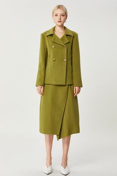 Final Sale Please note that this is a final sale item. This item is not eligible for returns, exchanges, or any further reductions in price. Fabric: 100% Merino wool Color: Olive green Care: Dry clean Emmeline Coat is the definition of modern classic. A timeless olive green with with a fitted silhouette and pointed collar is perfect for work, or a chic night out. You'll feel the quality of the hand-sewn double-faced pure wool fabric as soon as you put it on. Pair with our Emmeline Wool Skirt for Wool Skirt, Wool Skirts, Wool Fabric, Modern Classic, Fabric Care, Hand Sewing, Final Sale, Olive Green, Merino Wool