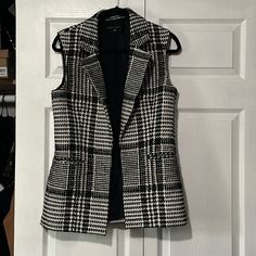 Theory Eldora Glen Houndstooth Plaid Sleeveless Blazer Vest Sized Women's Us 6 Good Sized Front Pockets And New Condition! This Vest Has Never Been Worn By Me And Has Been Sitting In My Closet For About Over A Year. It's Not My Exact Size But With The Measurements I Wanted To Style It More With Oversized Fashion But I Never Ended Up Wearing It. Made In Vietnam And Made Out Of 53% Virgin Wool / 43% Cotton / 4% Polyamide Great Condition With No Damage Such As Rips, Stains, Holes, Discoloration, Etc.... Original Retail Is Estimated $455.00 From What I Have Seen Online. Sleeveless Blazer Vest, Oversized Fashion, Sleeveless Blazer, Blazer Vest, A Year, Vietnam, Jackets & Coats, Jackets For Women, Plaid