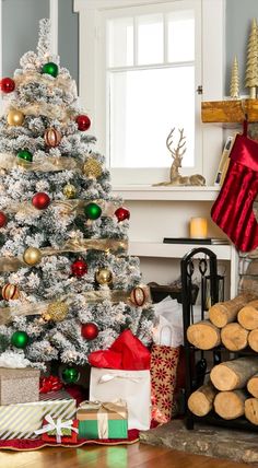 a decorated christmas tree with presents under it