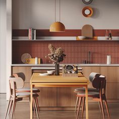 a wooden table sitting in the middle of a kitchen next to a wall mounted clock