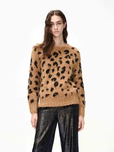 MO&Co. Women's Leopard Print Knitted Sweater This sweater is crafted from a luxurious blend of alpaca wool, providing an exquisite softness with a bold leopard print to make a statement. The classic round neckline creates an elegant silhouette, while the plush texture of the wool envelops you in cozy comfort. Features : - Regular fit, round neckline, wild leopard patterns- Fuzzy fleece effect with a cozy and soft wool texture- Ribbed trims on the waist and cuffs Code: MBC4SWT014The back length o Wool Texture, Wild Leopard, Wool Textures, Leopard Sweater, Leopard Print Sweater, Camel Sweaters, Print Sweater, Leopard Pattern, Alpaca Wool