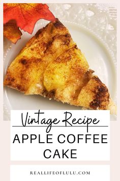 a slice of apple coffee cake on a white plate with an orange leaf in the background