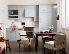 the kitchen is clean and ready to be used as a dining room or living room