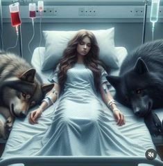 a woman laying in bed between two wolfs