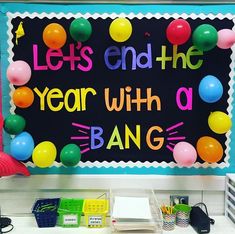 a bulletin board that says let's end the year with a bang