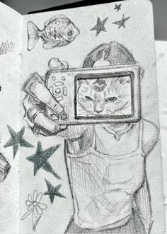 a drawing of a cat taking a selfie in front of a mirror with fish and stars on it