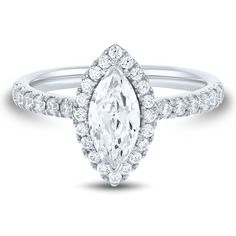 an engagement ring with a pear shaped diamond