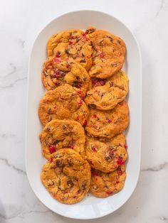 a white plate filled with cookies on top of a table