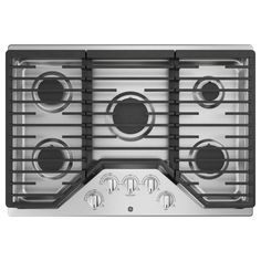 a stainless steel stove top with four burners