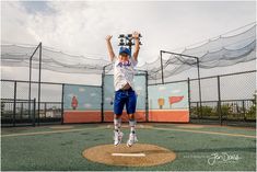 a person jumping in the air on a baseball field