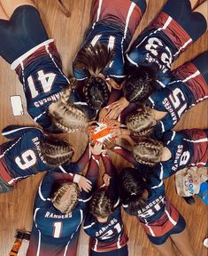 a group of girls huddle together in a circle