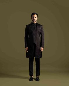 The Achkan, made from high-quality Black Linen Satin, features a double panel design with unique center stitching and is embellished with detailed thread work, Chir, and Sequins for a luxurious finish

Size Chart For Men





	
	
					Men's Size Chart
		

		
		
						
				Size Chart For Men
				Custom Size Measurement Guide
			
			
				
				
				Custom Size Measurement Guide
1. Take your measurements at ease…don’t hold your breath!
2. Be a little generous with the measurements. It’s always easie Luxury Formal Kurta With Intricate Embroidery, Embroidered Tailored Sherwani For Semi-formal Occasions, Designer Tailored Outerwear For Festive Occasions, Designer Tailored Outerwear For Festive Season, Luxury Embroidered Kurta For Ceremonial Occasions, Luxury Nehru Jacket With Zari Work For Formal Events, Designer Kurta With Intricate Embroidery For Formal Occasions, Designer Formal Kurta With Intricate Embroidery, Luxury Formal Nehru Jacket With Zari Work