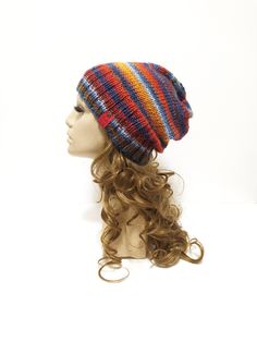 A unique, colorful, cozy, slouchy beanie, made out of high quality yarn. It's warm and comfortable to wear. The majority of wool (60%) in the yarn gives You warmth and softness, the acrylic (40%) prevents from itchiness and makes the item durable. You can wear the beanie in two ways - as a slouchy beanie, or with folded brim - this way gives more warmth to the ears.  The hat in the photo fits a standard woman's head circumference 54-56 cm, it's about 27cm-28cm high with the brim. If You wish your beanie in a different size, just let me know, I will be happy to knit it for You :-) Please take into account that the resizing may slightly affect the layout of the pattern (the skeins of wool are multicolored), but it will not change the colors of the item. Please remember, that the color of the Woolen Clothes, Colorful Hat, Wool Hat Knit, Hat Wool, Hat Knit, Cozy Hat, Fancy Hats, Alpaca Yarn, Wool Beanie