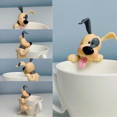 a dog sticking its head out of a coffee cup