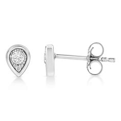 These pear shaped stud earrings are crafted in .925 sterling silver and feature 1/10ct TDW of diamonds. Each earring features a single sparkling round cut diamond in a miracle setting that adds to the earrings' sparkle. A polished silver halo creates a frame around the earring. These studs secure with a push back mechanism. White Gold Teardrop Diamond Earrings With Single Cut Diamonds, Pear-shaped White Gold Diamond Earrings With Accents, Teardrop Fine Jewelry Diamond Earrings With Single Diamond, Teardrop Single Diamond Earrings In Fine Jewelry Style, Teardrop Earrings With Single Diamond For Anniversary, White Gold Pear Shaped Teardrop Earrings With Diamond Accents, Pear-shaped Sterling Silver Diamond Earrings, Silver Pear-shaped Sterling Silver Diamond Earrings, Silver Diamond Earrings With Pear Accents