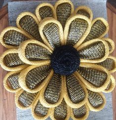 a decorative flower made out of woven material