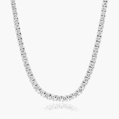 14K White Gold Lab-Created Diamond Half Tennis Necklace (5.00 CTW -F-G / VS1-VS2). A modern twist on the classic tennis necklace, this piece features beautiful, dazzling diamonds. This necklace is perfect for those who love to combine a timeless look with contemporary style. Wear it alone or pair it with multiple necklaces for a lovely, layered look. Luxury Diamond Necklaces With Vs Clarity, Vs Clarity Diamond White Luxury Necklace, Luxury White Gold Necklace With Vs Clarity, Luxury Diamond White Vs Clarity Necklace, Luxury Diamond White Necklace With Vs Clarity, Luxury Diamond Necklace With Vs Clarity For Formal Occasions, Multiple Necklaces, Diamond Tennis Necklace, Jewelry Photoshoot