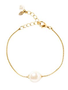 Simple and classic, this bracelet will add a touch of nautical chic to any ensemble. Made by... Classic Gold Chain Bracelet With Pearls, Classic Gold Pearl Chain Bracelet, Classic White Chain Bracelet With Pearl Drop, Classic Gold Chain Bracelet With Pearl Charm, Chic Adjustable Pearl Bracelet With Charm, Chic Adjustable Pearl Bracelet With Pearl Charm, Classic White Pearl Chain Bracelet, Chic Adjustable Pearl Bracelet, Classic Pearl Bracelets With Adjustable Chain