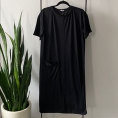 Long Shirt Dress With 1 Pocket, Size Small Black Midi Dress For Spring Loungewear, Black Relaxed Fit Midi Dress For Casual Wear, Black Relaxed Fit Midi Dress Casual, Black Relaxed Fit Midi Dress Casual Style, Casual Black Relaxed Fit Midi Dress, Black Short Sleeve Relaxed Midi Dress, Casual Short Sleeve Black Midi Dress, Casual Black Short Sleeve Midi Dress, Black Relaxed Fit Short Sleeve Midi Dress