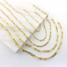 "\"14k Gold Thick Paperclip Chain Necklace | Rectangle Link, Bold Link, Staple Chain, Layering Chain Necklace w/ Lobster Clasp | Gift for Her\" P R O P E R T I E S * Material: 14k Yellow Gold, 14k Rose Gold, 14k White Gold * Link Size #1: 0,40\"x0,12\" // 10,0mm x 3,2mm * Link Size #2: 0,44\"x0,14\" // 11,1mm x 3,5mm * Link Size #3: 0,53\"x0,16\" // 13,5mm x 4,1mm * Link Size #4: 0,67\"x0,20\" // 17,0mm x 4,9mm * Link Size #5: 0,79\"x0,24\" // 20,0mm x 6,0mm * Lock: Lobster Claw Clasp * Length: Tarnish Resistant Chain Necklace With Rectangular Links, Modern Rectangular Figaro Chain Jewelry, Classic Rectangular Tarnish Resistant Chain Necklace, Modern Rectangular Cable Chain Necklace, Modern Yellow Gold Rectangular Chain Necklace, Gold Rectangular Paperclip Chain Jewelry, Modern Rectangular Yellow Gold Chain Necklace, Classic Tarnish-resistant Rectangular Chain Necklace, Delicate 14k Gold-filled Paperclip Chain Necklace