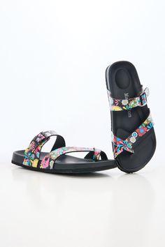 Step into comfort and style with Maibulun Thong Toe Cushioned Footbed Sandals. Designed with a cushioned footbed and thong toe, these sandals provide the perfect blend of support and style. The multi tropical prints adds a pop of color to any outfit, making these sandals a versatile addition to your wardrobe. 0.59" inch heel Slip-on / buckle closure Soft Cushioned footbed Man-made leather upper Man-made lining PU sole Synthetic Footbed Sandals With Single Toe Strap For Vacation, Synthetic Single Toe Strap Footbed Sandals For Vacation, Synthetic Single Toe Strap Vacation Footbed Sandals, Synthetic Toe Loop Footbed Sandals For Beach, Summer Toe Loop Synthetic Footbed Sandals, Beach Footbed Sandals With Toe Loop And Removable Insole, Beach Footbed Sandals With Removable Insole And Toe Loop, Cushioned Toe Post Footbed Sandals For Beach, Summer Toe Loop Flip Flops With Cushioned Footbed