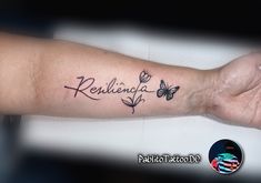 a woman's arm with butterflies and the words reunicia written on it